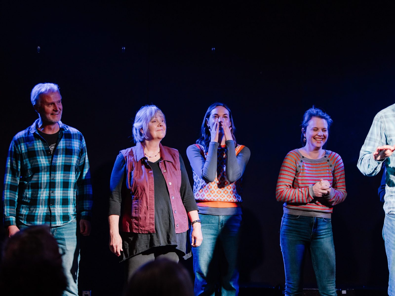 Bainbridge Improv Collective lined up on stage at Northwest Improv Fest